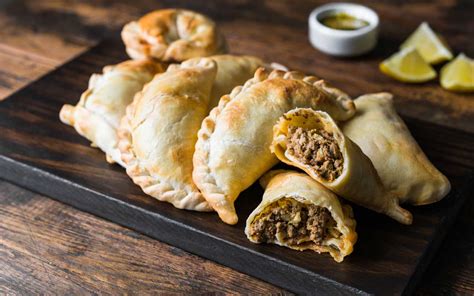The most famous Argentine snack, appetizer, or meal (depending on how many you’re eating), empanadas are plump bread packets full of meat, vegetables, or cheese. Highly addictive, they wash …